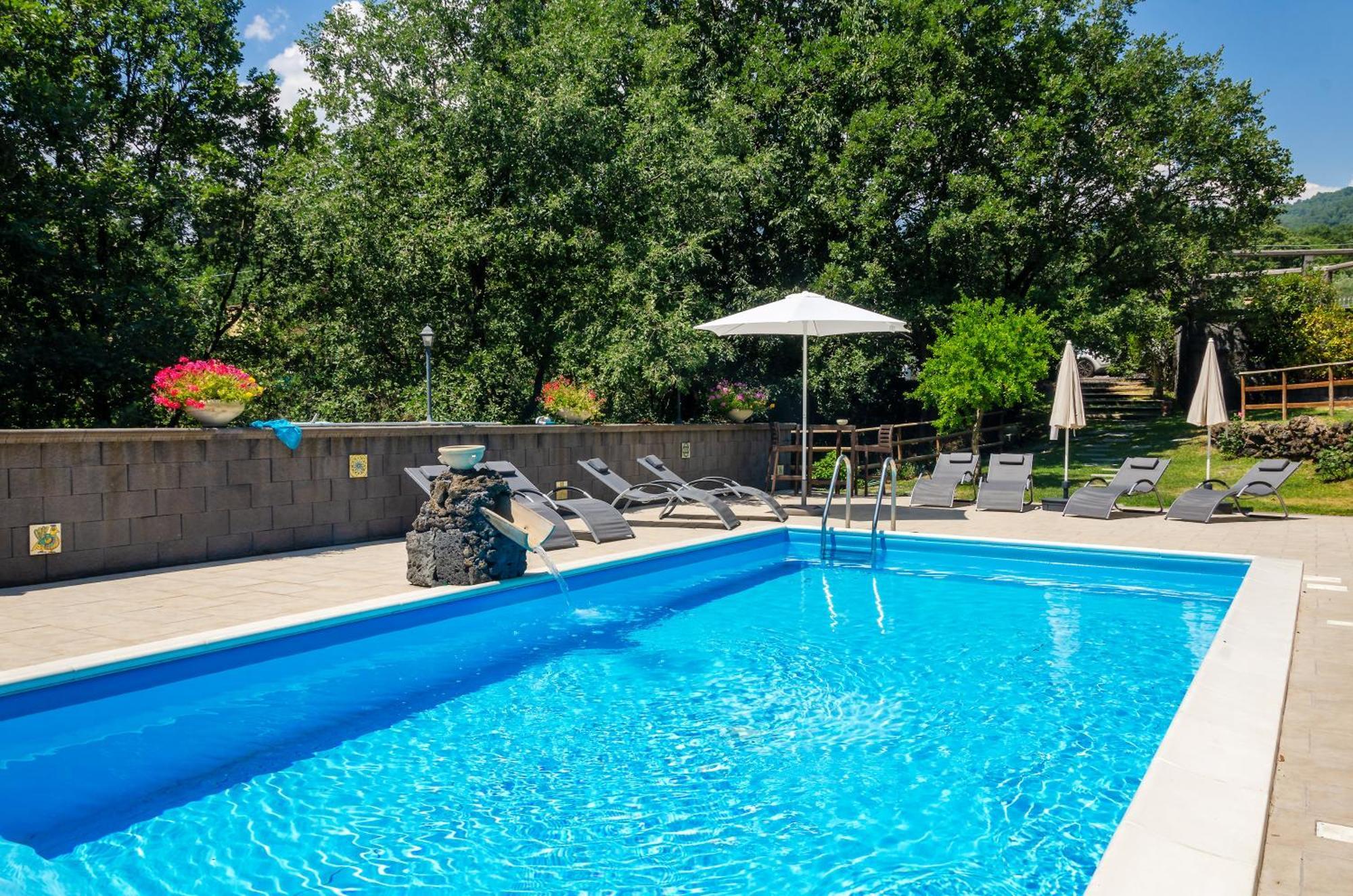 Villa Del Gelso Chalet Nel Parco Delletna ماسكالي المظهر الخارجي الصورة